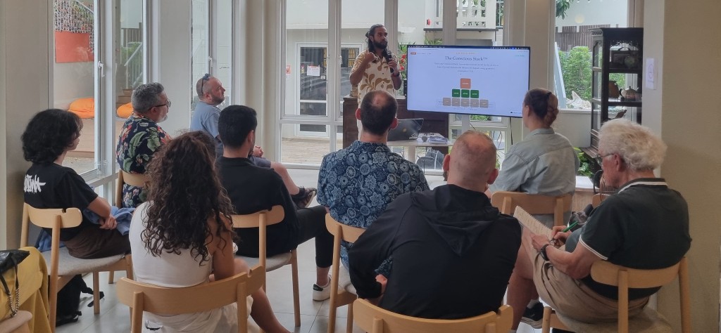 Conscious Technologists at an in-person workshop with The Conscious Stack on screen